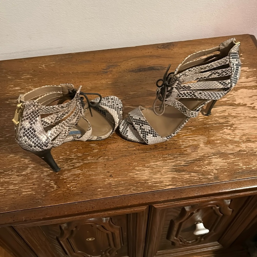 High heals. Size 10snake skin type